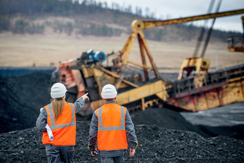 workers_in_open_pit_mine two workers in an open pit mine